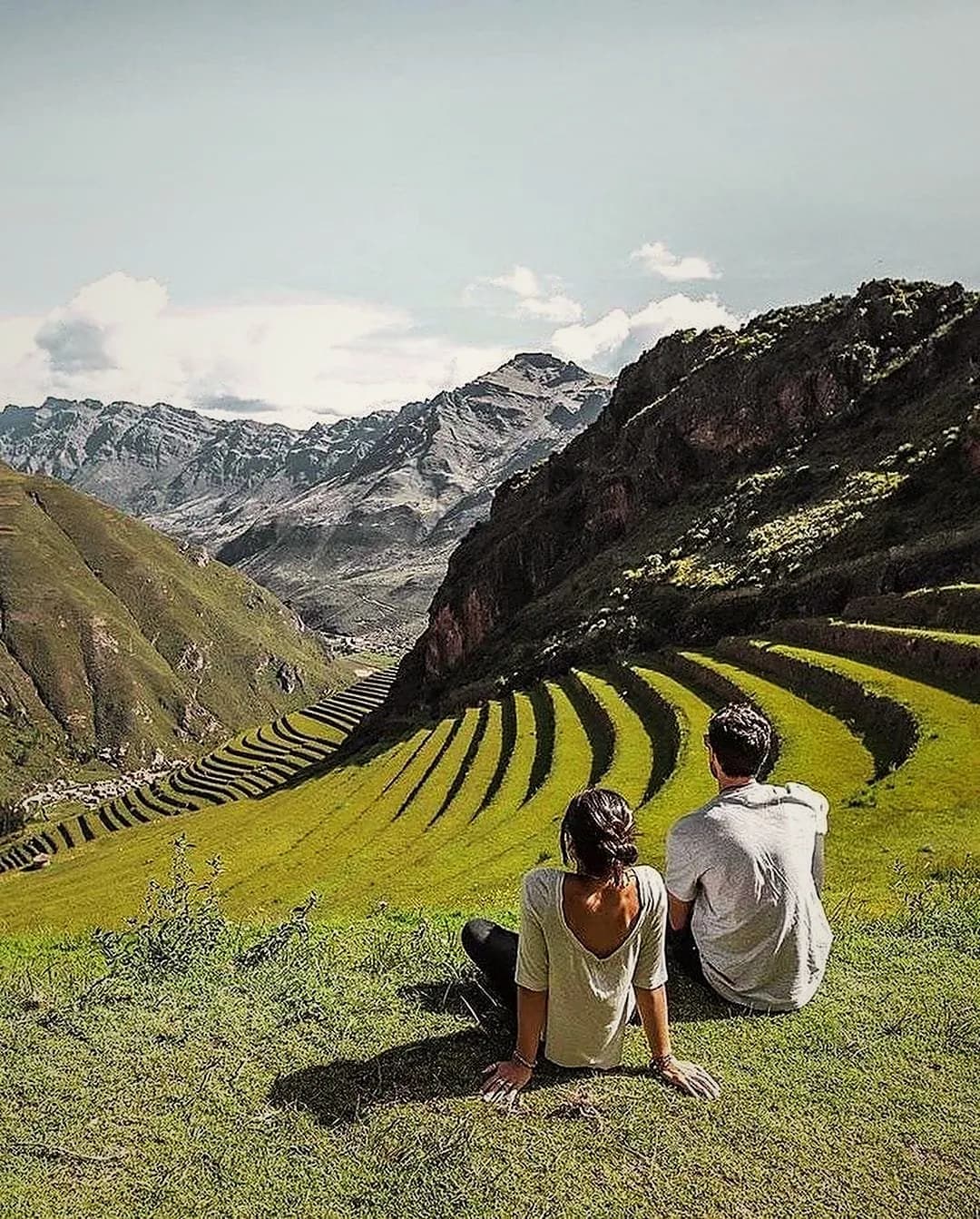 Travellers looking over the Inca terraces of Pisac, Sacred Valley