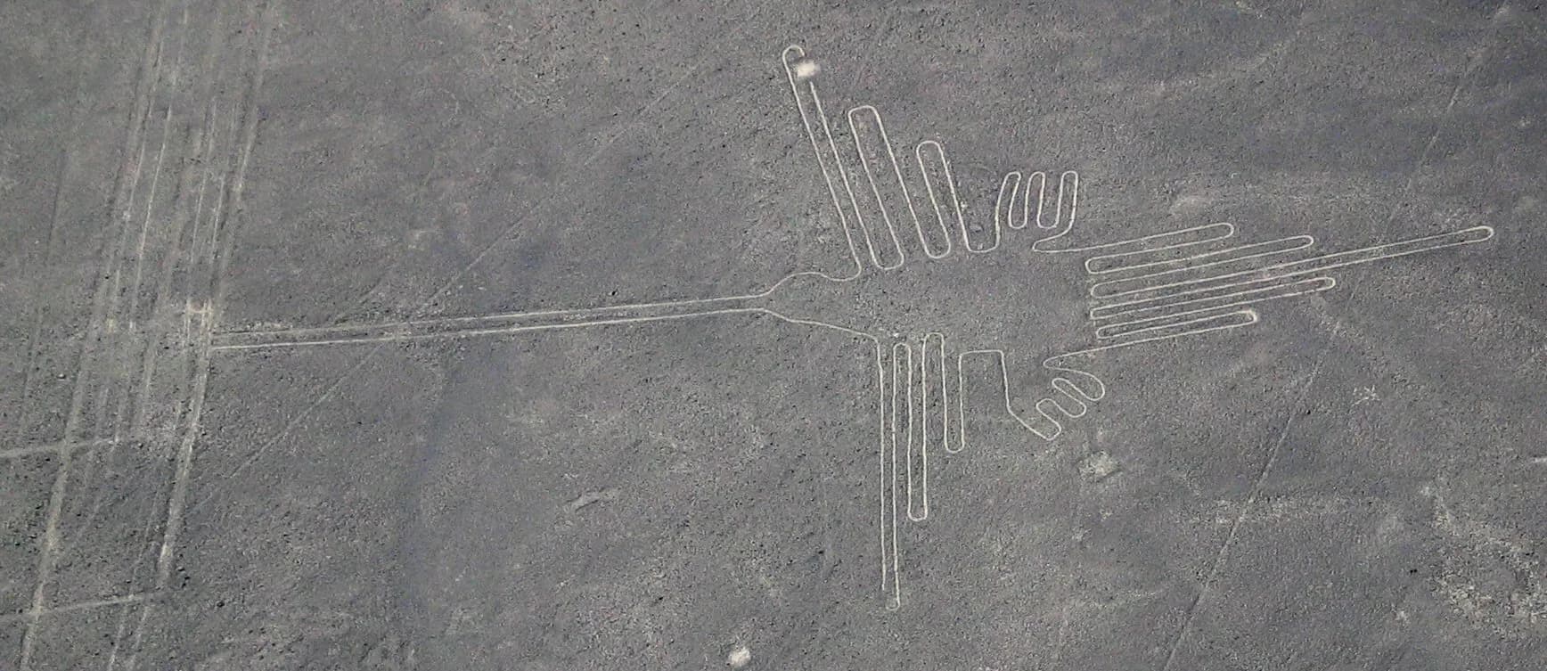 Aerial view of the hummingbird geoglyph of the Nazca Lines