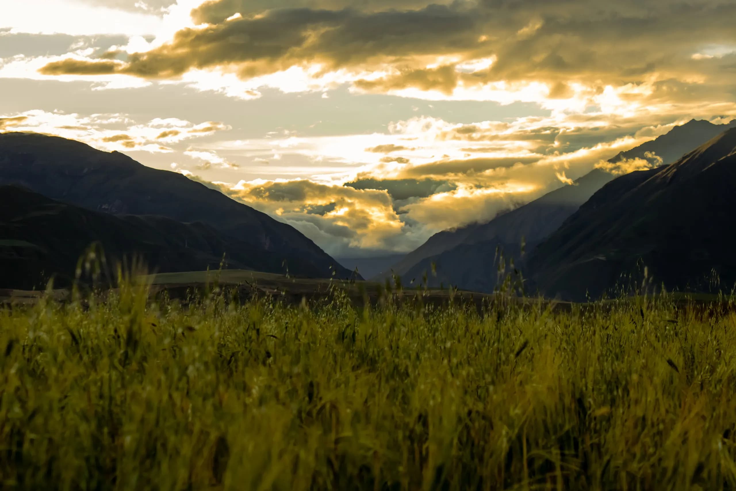 Sunrise over the mountains of an Andean valley